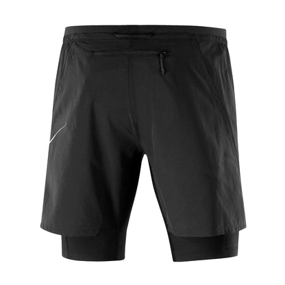 Black shorts with a small logo on a white background