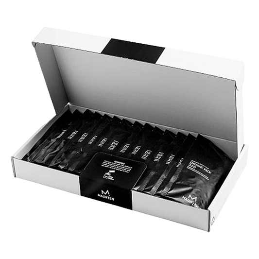 Box of black drink mix packets with a visible brand logo on a white background