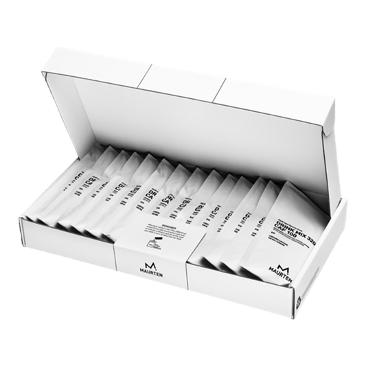 Box of white packets with black text on a white background